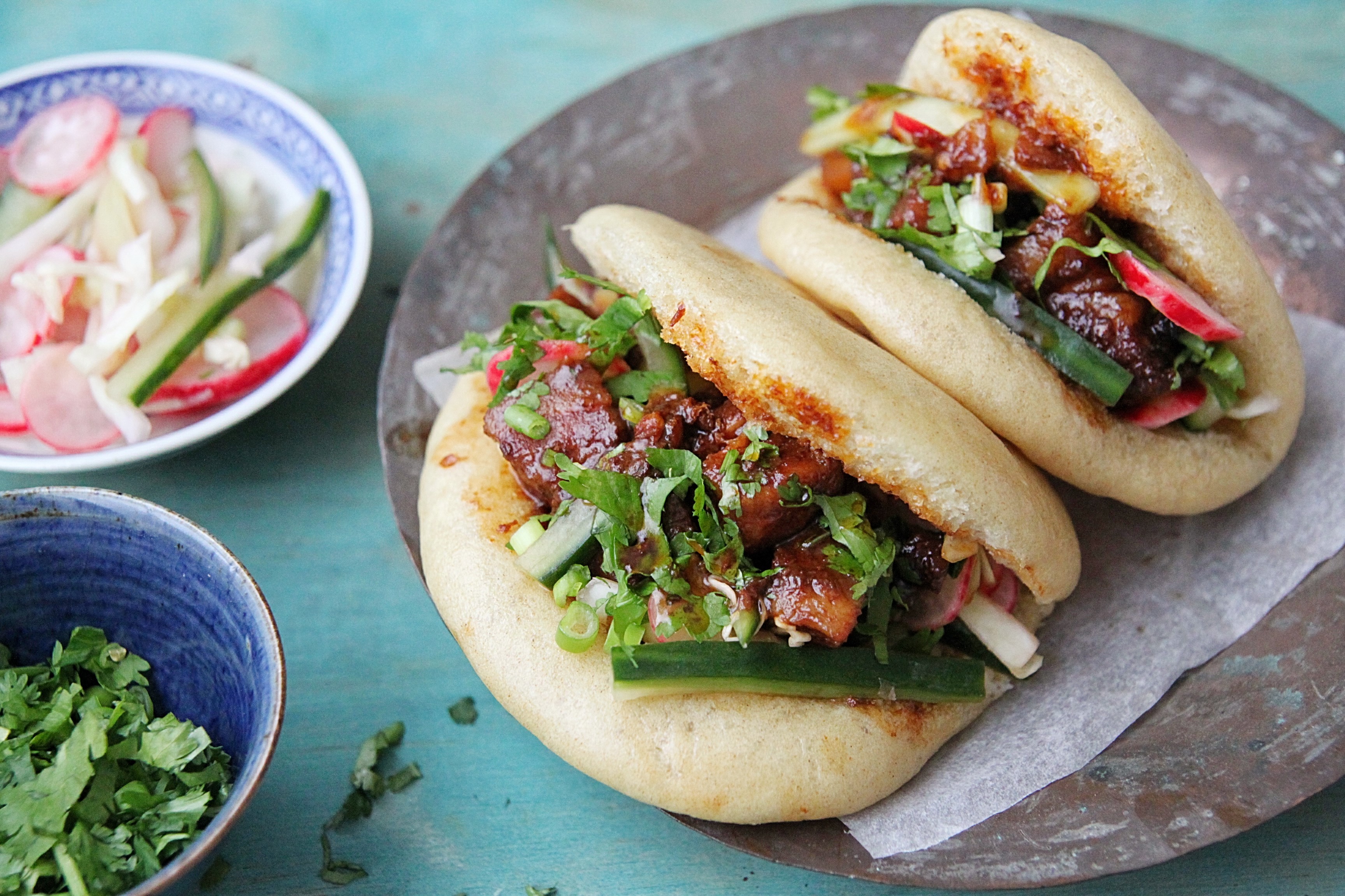 Image of two Chinese Steamed Bun Burgers.