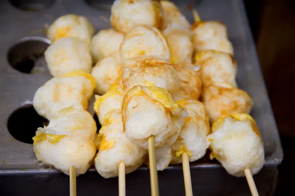 Image of skewers of fried quail eggs.